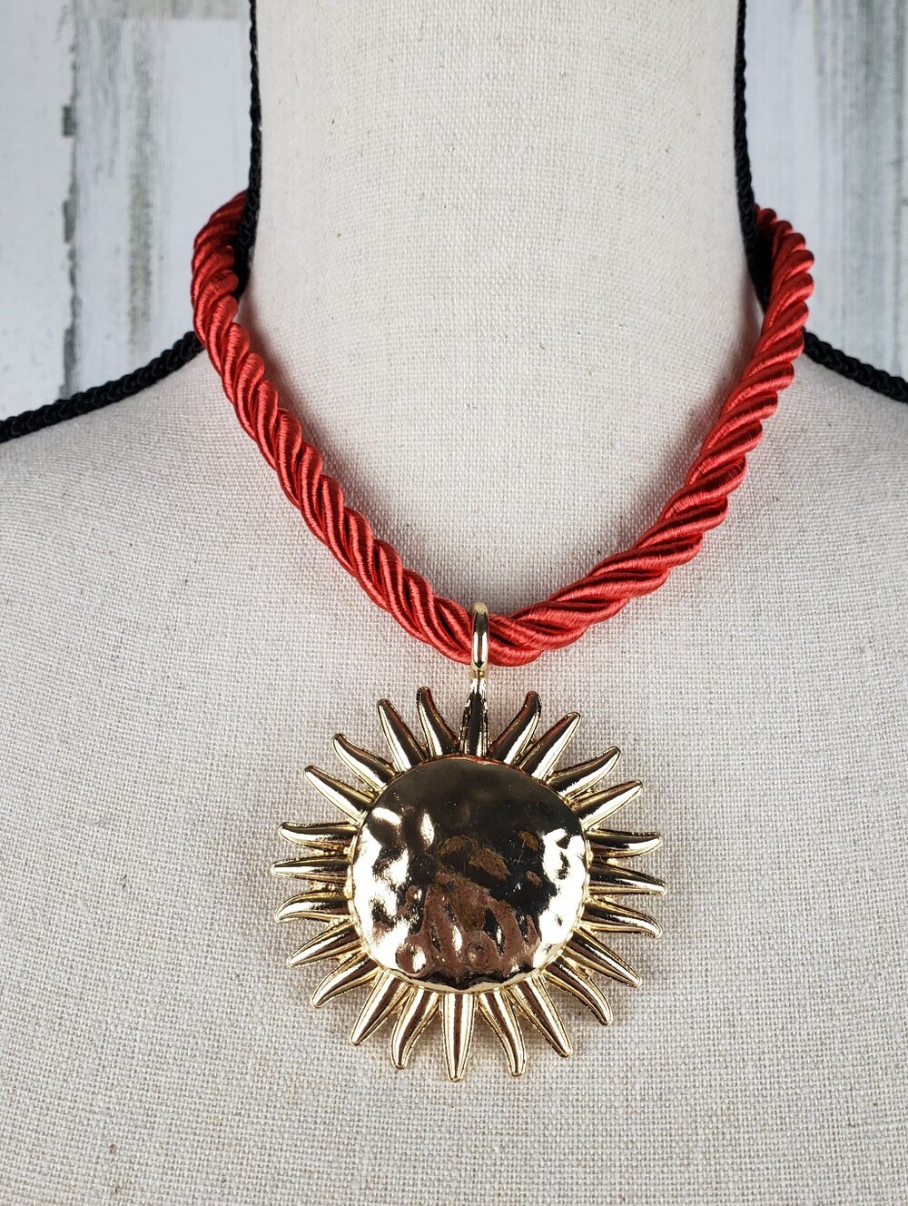 Gold Sunburst Pendant Necklace with Red Cord